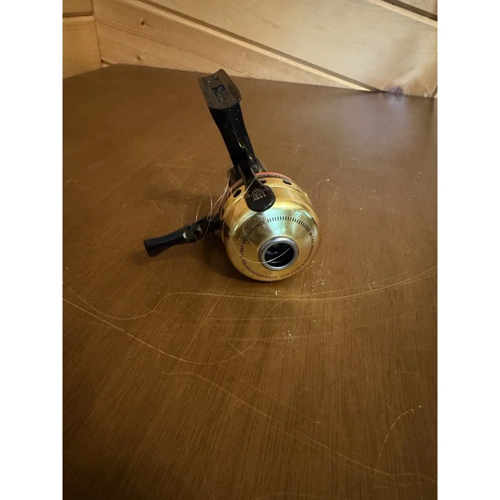 Vintage Daiwa US-80XA Spincast Fishing Reel - Gold & Black Micro Adjustable Drag